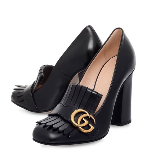 gucci heeled loafers.